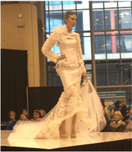 Model wearing white dress Creativ Catwalk design