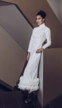 Cashmere competition model in white dress