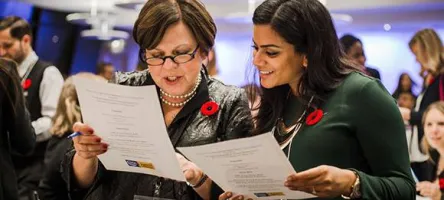 Industry partner talking to student