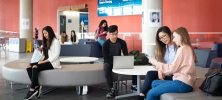 Students sitting on couches at Waterfront campus