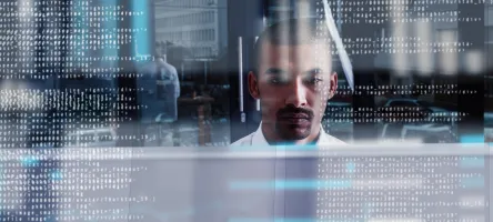 Cropped shot of a young computer programmer looking through data