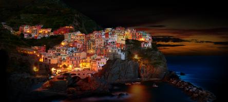 A seaside village on a cliff.