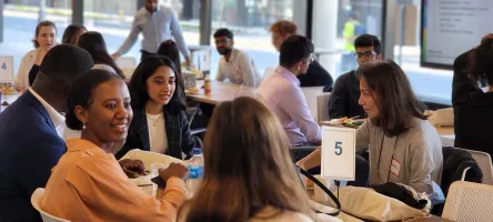 Students sitting at a table, participating in the Centre for Business Student-Alumni Mentorship Program