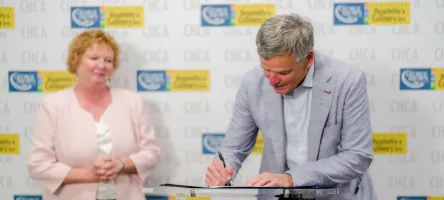 Two individuals signing a cheque for the Helderleigh Foundation – Lorraine Trotter Endowment Fund