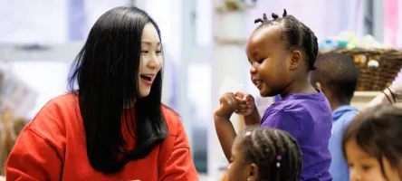 Early Childhood Education student playing with children