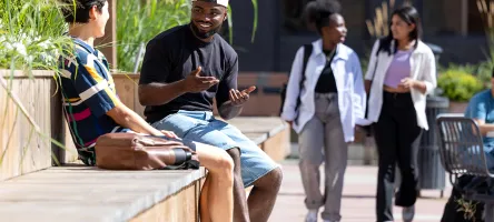 Students on St. James Campus patio