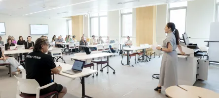 A full classroom of faculty during an EvolvED 2025 session.t