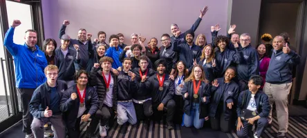Team George Brown cheers as a group with their medals at the 2026 Skills Ontario Competition.