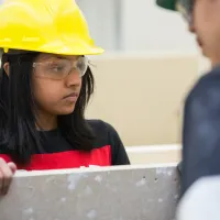 Trades students working in the shop.